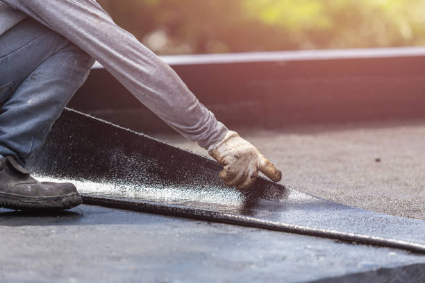 Professional Basement Waterproofing technician working in Potomac, MD